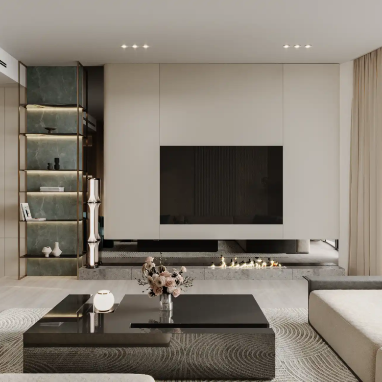 Modern living room at Binghatti Aquarise with neutral tones, a black coffee table, light beige sofas, blue chair, wall-mounted TV, built-in shelves, decorative items, artwork on the wall, and large windows with sheer curtains.