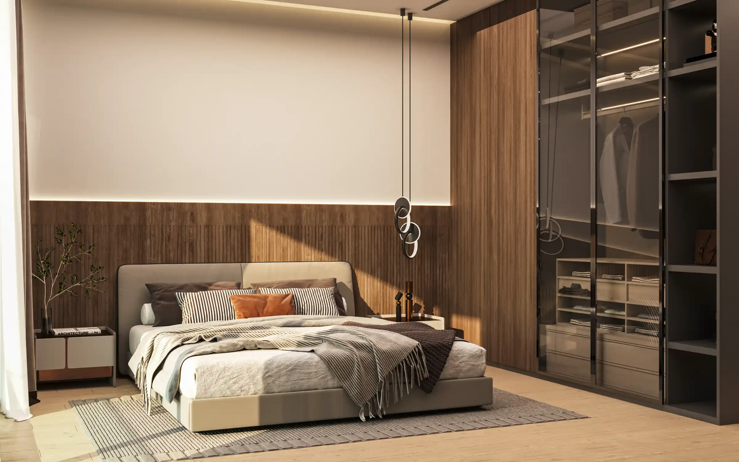 Modern bedroom at Binghatti Apex with a low bed, gray bedding, and decorative pillows. Wooden accent wall, built-in wardrobe with glass doors, pendant lights, and a small plant by the window create a warm, minimalist atmosphere.